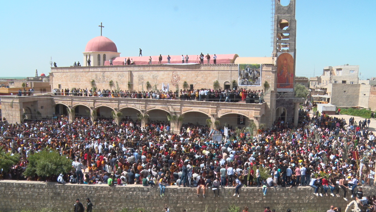 Above: Christians gather by the thousands on Palm Sunday in Qaraqosh, Iraq, April 2019.